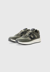 Olive green athletic shoes with a mesh and synthetic upper, black accents, a chunky white midsole, and a textured black rubber sole.