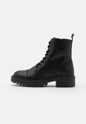 Bottines à lacets - black
