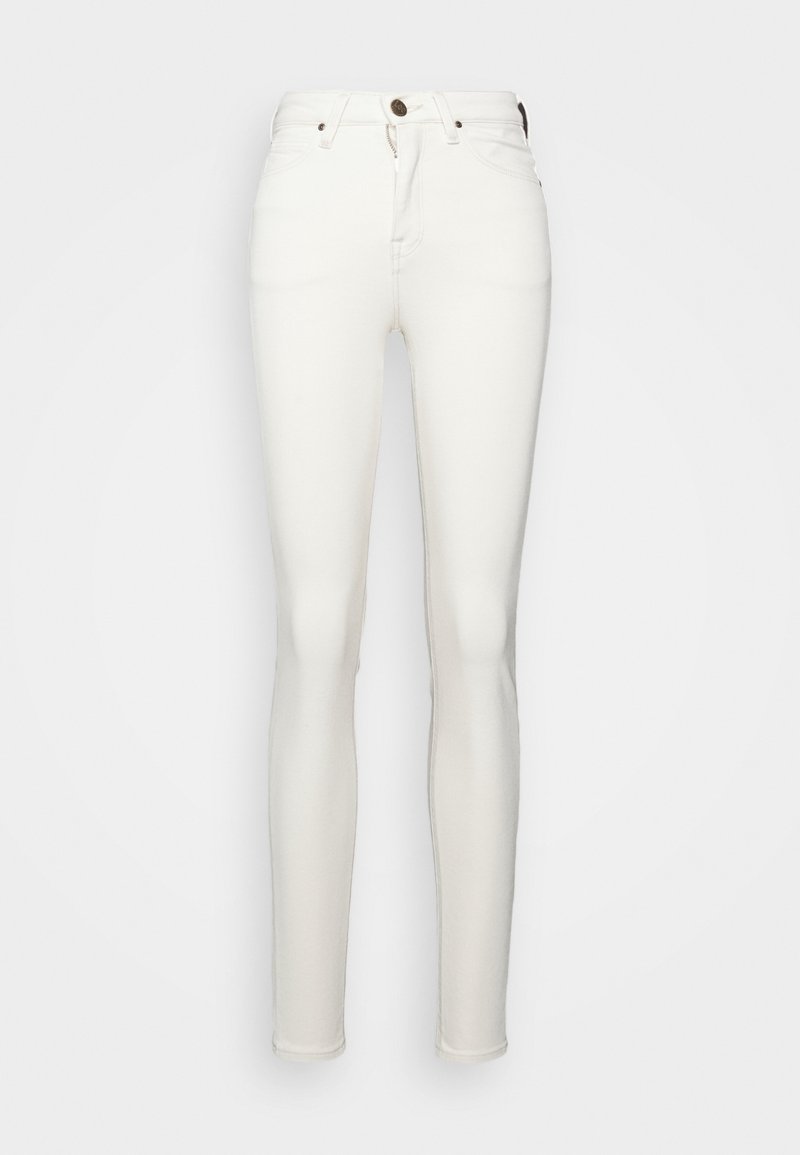 Vaqueros skinnies de mezclilla blanca con cinco bolsillos, cremallera en la bragueta y un solo botón de metal en la cintura. Textura suave con costuras mínimas.