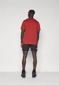 The North Face HAKUUN SHORT - Kurze Sporthose - black