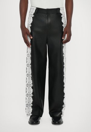 Leather trousers - black