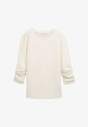 Off-white textuur lange mouwen top met gerimpelde mouwen en geribbelde manchetten, ronde halslijn en een losse pasvorm.