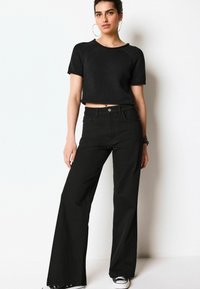 Next WIDE LEG  - Flared jeans - black