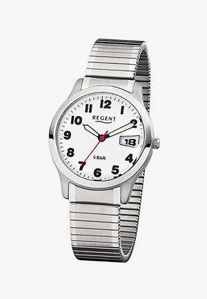Montre-bracelet en métal argenté avec cadran blanc, chiffres noirs, guichet de date à 3 heures, et aiguille des secondes rouge, affichant l'heure 10:10:35.