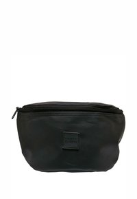 Borsa da toiletta nera realizzata in materiale liscio, con chiusura a zip, forma arrotondata e un piccolo etichetta in rilievo "Urban Classics" sul fronte.