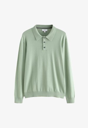 Lichtgroen poloshirt met lange mouwen gemaakt van zachte stof. Voorzien van een kraag en een knoopsluiting met drie knopen. Geribbelde manchetten en zoom.