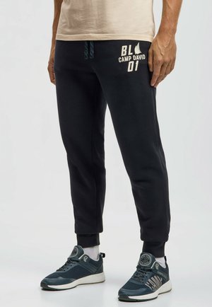 OGGING MIT PUFFPRINT - Jogginghose - blue navy