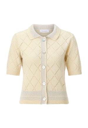 Rövid ujjú krémszínű kardigán gyémánt mintás kötött mintával, gombos elől, texturált gallérral, és kontrasztos bordázott szegéllyel és díszítéssel.