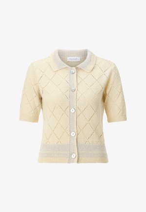 Rövid ujjú krémszínű kardigán gyémánt mintás kötött mintával, gombos elől, texturált gallérral, és kontrasztos bordázott szegéllyel és díszítéssel.