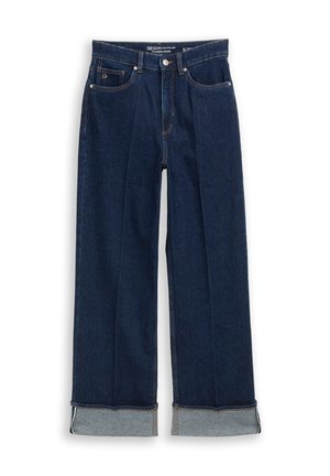 Wijde denim jeans in donkerblauw met lichtblauwe omgeslagen zomen, voorzien van oranje stiksels en voorzakken. Gemaakt van stevig denimstof.