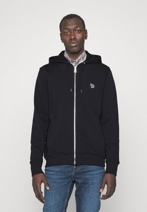Mörkblå zip-up hoodie med dragsnören och kängurufickor, med en liten flerfärgad logotyp på vänster bröstområde. Klassisk passform.