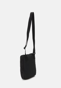 Calvin Klein Jeans SPORT ESSENTIALS REPORTER UNISEX - Borsa a tracolla - black