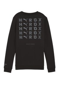 Čierna mikina vyrobená z bavlny, s rozmazaným šedým textovým vzorom "HYROX" na zadnej strane, s rebrovanými manžetami a okrúhlym výstrihom.