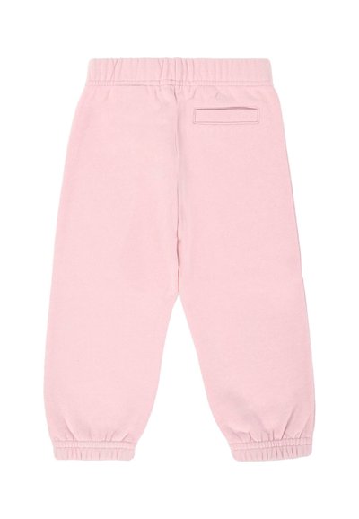 Jasnoróżowe dresy wykonane z miękkiej tkaniny. Elastyczny pas w talii i mankiety, z jedną tylną kieszenią. Prosty design bez wzorów.