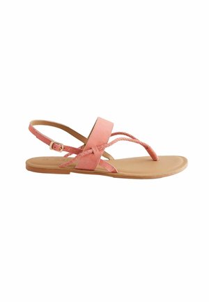 Roze suède sandaal met gevlochten banden, verstelbare enkelband en vlakke tan zool. Minimalistisch ontwerp voor casual gebruik.