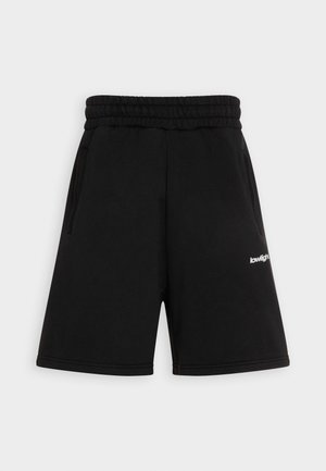 Black elastic waistband shorts with side pockets and small white "lowlight" logo on the right leg, displayed on a plain background.
