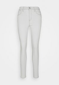 Vaqueros skinny de un gris claro, hechos de denim. Con tiro alto, cinco bolsillos y cierre de botón plateado en la parte frontal. Textura suave.