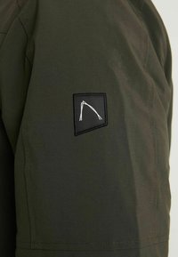 CHASIN' EXPLORER HYBRID - Zimní kabát - green