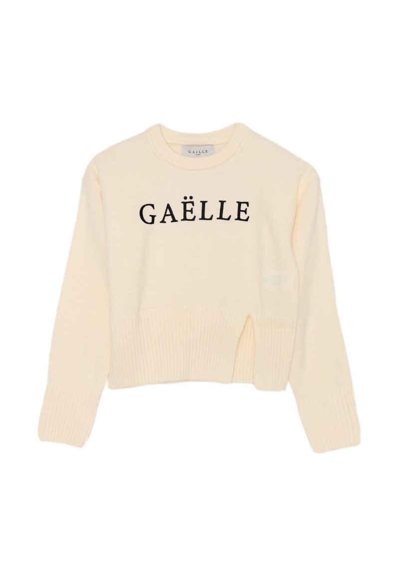 Maglione cropped color crema in materiale testurizzato, con collo rotondo e lettering nero "GAËLLE" sulla parte frontale.