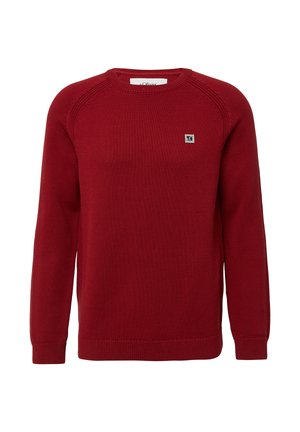 Raudona megzta svetrinė palaidinė su ilgomis rankovėmis ir maža kvadratinėm logotipų etiketė kairėje krūtinės pusėje.