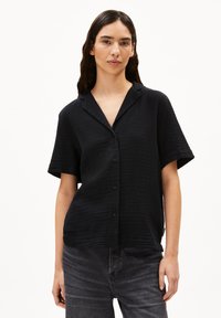 Zwarte korte mouwen overhemd met knopen, gemaakt van textuurstof, met een comfortabele pasvorm, kraag en subtiele patroon details.