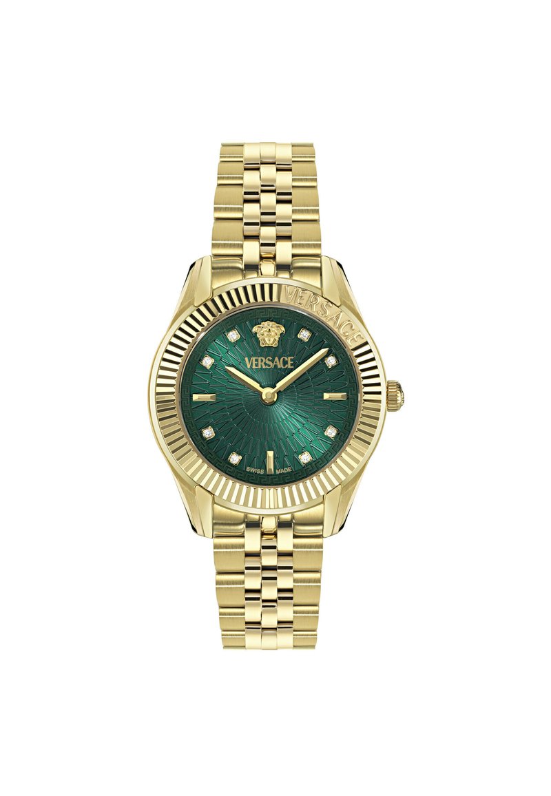 Arany színű óra bordázott kerettel és zöld mintázatú számlappal. Gyémánt jelölők és fényes felületű fém karkötő jellemzi. Versace logó található rajta.