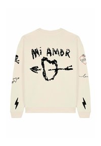 Felpe crema con grafiche nere, inclusi "Mi Amor," un cuore, frecce, un teschio e motivi di fulmine sulle maniche. Collo rotondo.