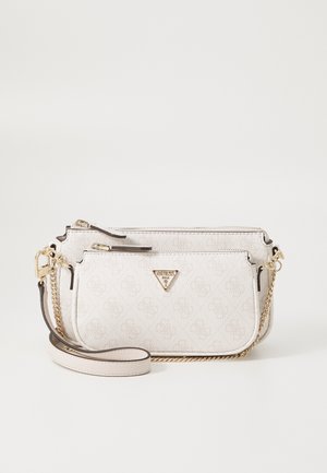 White textured handbag with two zippered compartments, gold hardware, chain detailing, and a triangular logo on the front. Adjustable strap.
