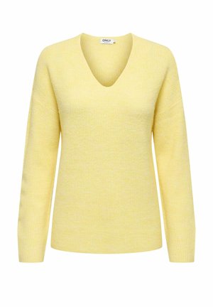 Keltainen neulepaita, jossa on V-pääntie, pitkät hihat ja ribbitekstuuri. Ominaisuuksiin kuuluu rento malli ja pehmeä materiaali mukavuutta varten.