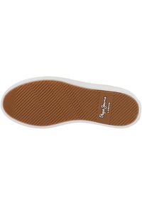 Brown rubber sole with horizontal and vertical grooves, white midsole, and logo detailing. Textured surface for grip and traction.
