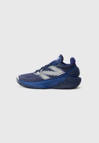 Blue athletic sneaker with white stripes, mesh upper, thick cushioned sole, and lace-up closure against plain gray background.