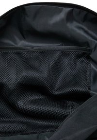 Black fabric bag interior featuring a mesh pocket. The texture is smooth with a matte finish; the mesh has a diamond pattern and zip closure.
