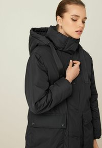 Next LONGLINE PADDED  - Vinterkappa /-rock - black
