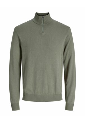 Svijetlozeleni džemper na patentni zatvarač s visokim ovratnikom. Ima duge rukave te rebraste manžete i rub. Glatka tekstura, jednostavan dizajn.