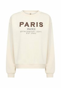 Crèmekleurige trui met de tekst "PARIS FRANCE" in bruine en zwarte letters, met geribbelde boorden en zoom, gemaakt van een zachte stof.