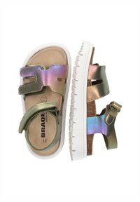 Metallic green sandals feature two adjustable straps, a soft cork footbed, and a textured white rubber sole with a ridged design.
