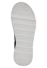 Suela de zapatilla negra con goma blanca de estrías, que presenta una superficie lisa y un sutil patrón de olas cerca del talón para tracción y soporte.