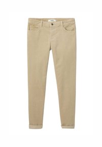 Pantalons en velours côtelé beige à coupe slim, cinq poches, fermeture à un bouton, et ourlets retroussés. Texture douce avec des côtes verticales.