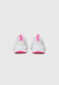 White athletic shoes with a textured gray upper, pink accents on the heel pull tab and outsole, and a smooth white midsole.