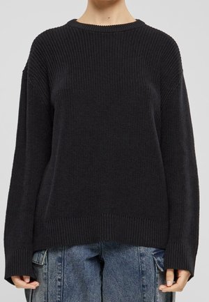 Stickad tröja - black