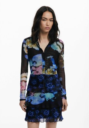Floral-patterned dress features a black base with blue, pink, and green accents, long sleeves, a buttoned collar, and layered pleated detailing.