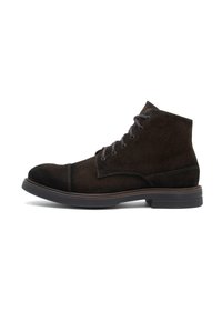 Dark brown suede ankle boots with a rounded toe, lace-up front, and a contrasting black rubber sole. Features stitching and minimal design elements.
