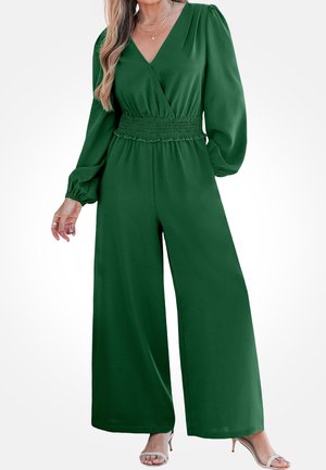 Tuta verde con scollo a V, maniche lunghe a palloncino, vita arricciata e pantaloni a gamba larga. Realizzata in tessuto liscio. Design semplice e sobrio.