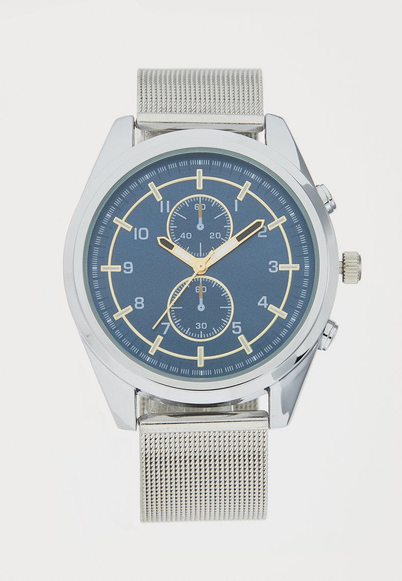 Silver-tone chronograph watch with a blue dial, gold accents, mesh band, and three sub-dials for timekeeping features.