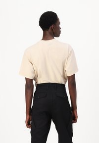 G-STAR ZIP REGULAR  - Hlačami s stranskimi žepi - black