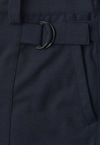 Dark blue fabric with a subtle diagonal pinstripe, featuring a fabric belt with a black metal D-ring buckle.