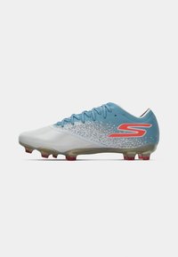 Cleats with a sleek design, featuring a light gray upper with blue accents, textured detailing, and red-tipped studs for traction.