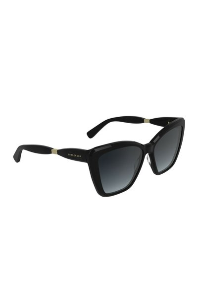 Schwarze übergroße Cateye-Sonnenbrille mit verlaufend dunklen Gläsern und goldenen Akzenten an den Bügeln, mit der Marke "Longchamp" an der Seite.