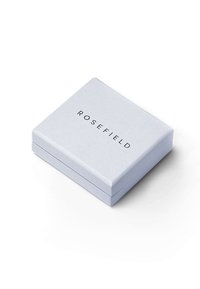 Kvadratna, svijetloplava kutija s mat površinom; utisnuti crni logo "ROSEFIELD" na vrhu; dizajnirana za nakit ili dodatke.