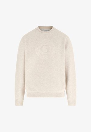 Svetlo bež pulover z okroglim izrezom, dolgimi rokavi in rebrastimi manšetami. Na sprednji strani je subtilen teksturiran logotip. Mehka tkanina.